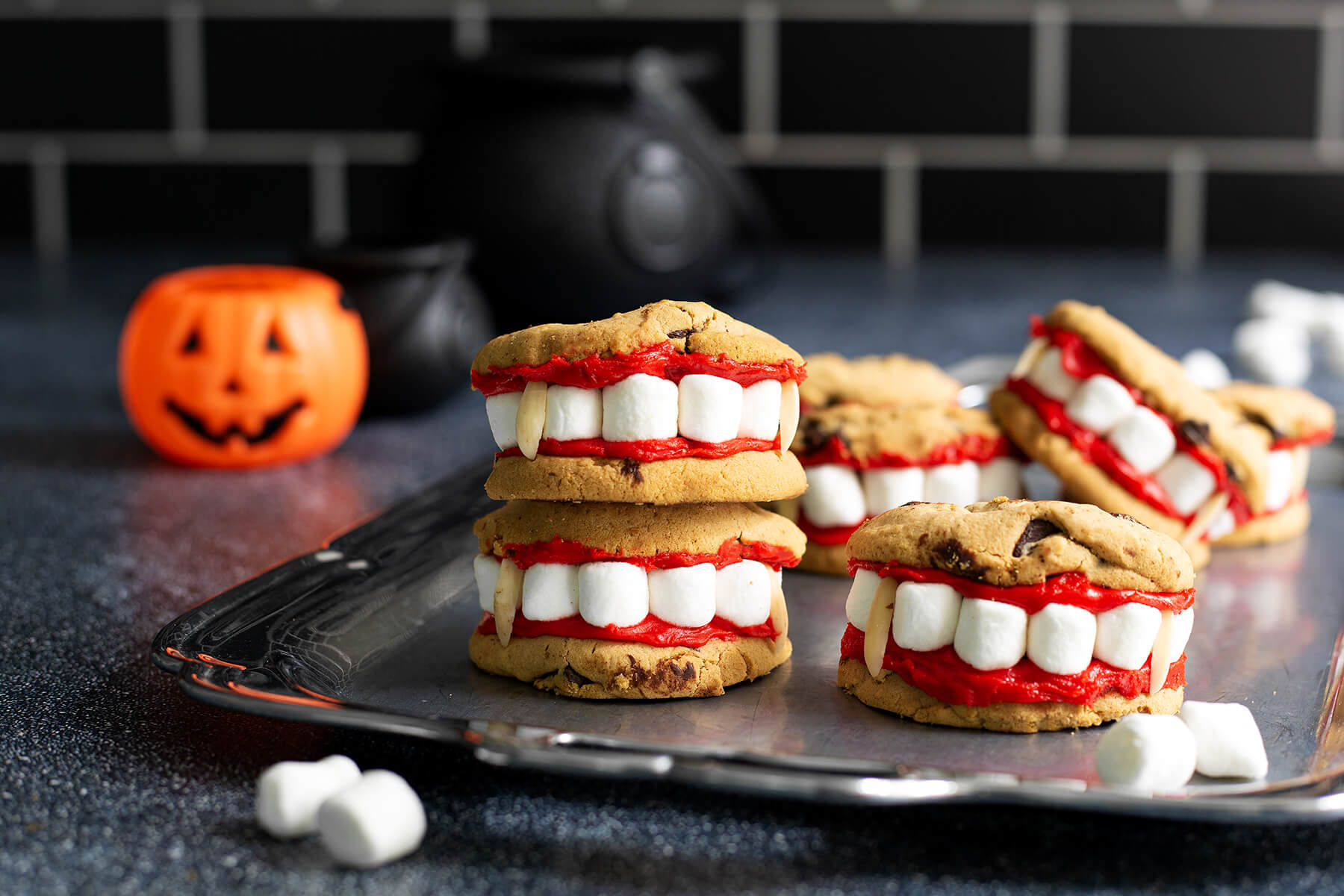 Cookies decorated to look like vampire teeth